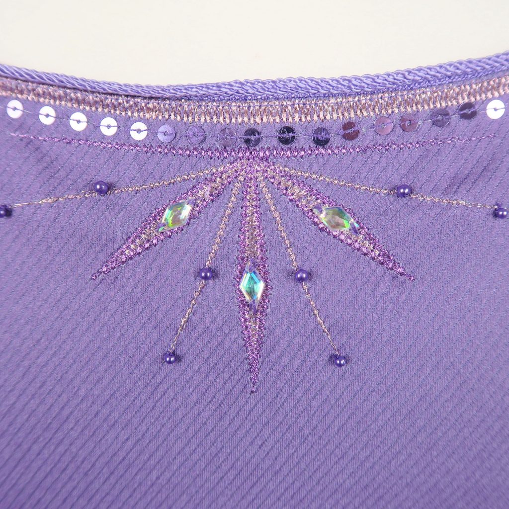 embroidery beneath neckline back